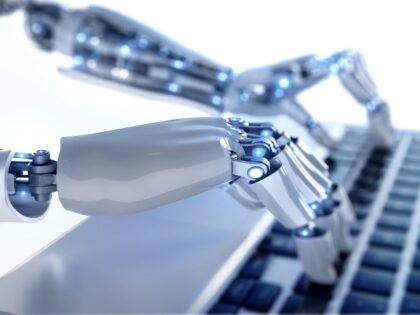AI Robot typing on laptop