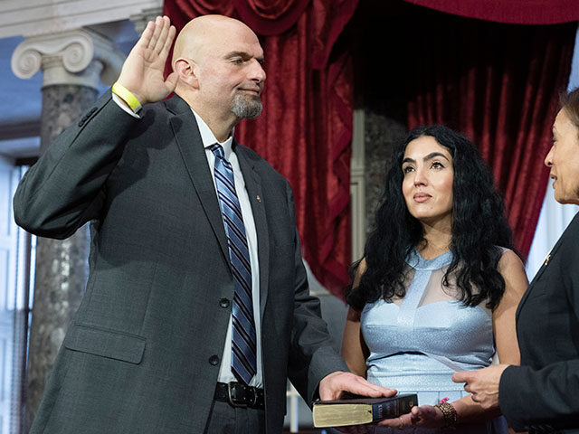 AP23003725302308 Title: Congress Image ID: 23003725302308 Article: Vice President Kamala Harris, right, par