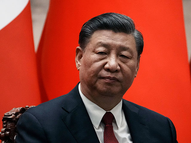 Chinese President Xi Jinping gives a joint press conference with France's President Emmanu