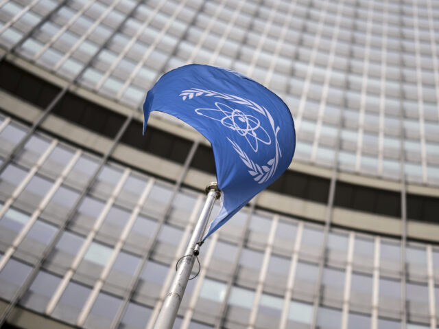 CORRECTION Austria IAEA CORRECTS DATE - A flag waves in front of the International Atomic Energy Agency (IAEA) in