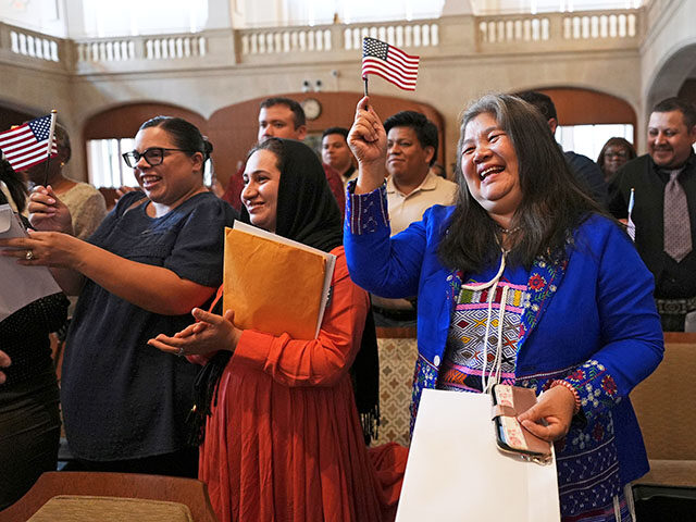 AP25184638402177 Title: New Citizens Ceremony Image ID: 25184638402177 Article: Bihajira Shams of Afghanist