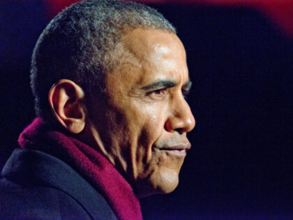 U.S. President Barack Obama grimaces during one of the many production delays as he and th