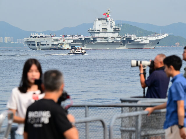China Flexes Military Muscles with Aircraft Carrier Visit to Hong Kong