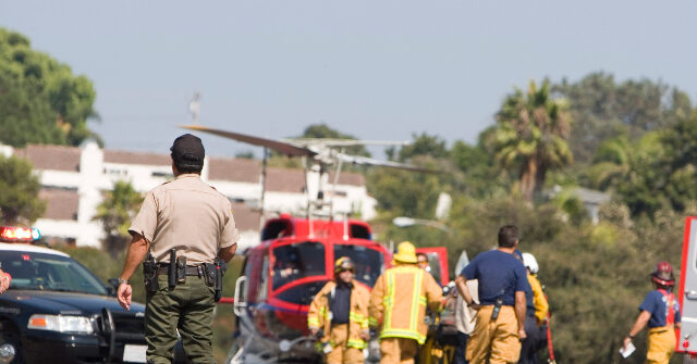 WATCH: Big Rig Jumps Guardrail into Oncoming Traffic In Fatal CA Crash