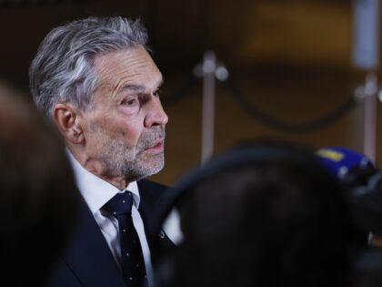 Netherland's Prime Minister Dick Schoof speaks with the media as he arrives for an EU