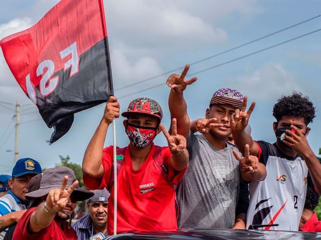 Supporters of the Sandinista National Liberation Front (FSLN) take part in a caravan in Managua, on July 19, 2020 during the 41st anniversary of the Sandinista Revolution, held without a public event due to the COVID-19 pandemic. (Photo by Inti OCON / AFP) (Photo by INTI OCON/AFP via Getty Images)