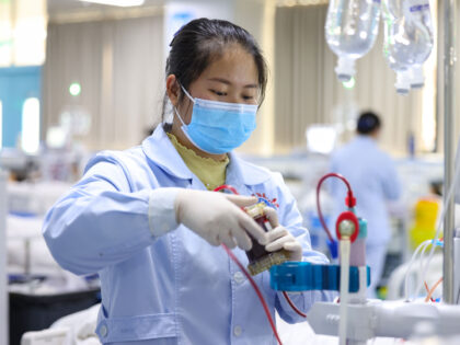 A nurse cares for a hemodialysis patient at the hemodialysis center of Yuping Dong Autonom