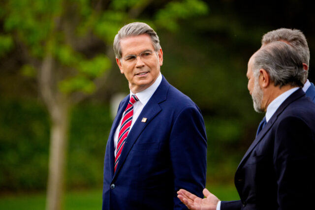WASHINGTON, DC - MARCH 28: Treasury Secretary Scott Bessent walks across the South Lawn to