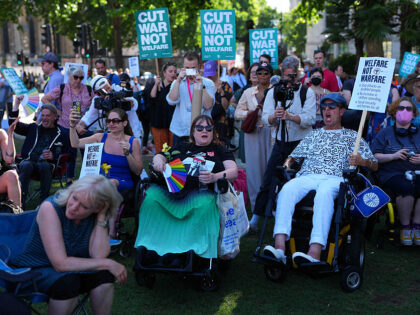 LONDON, ENGLAND - JUNE 30: People take part in a protest against disability welfare cuts o