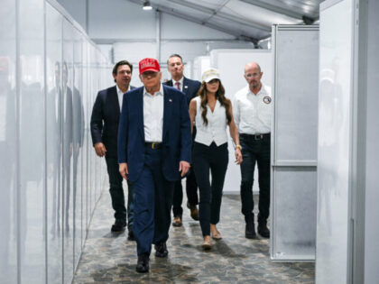 US President President Donald Trump (2L), Florida Governor Ron DeSantis (L), and Secretary
