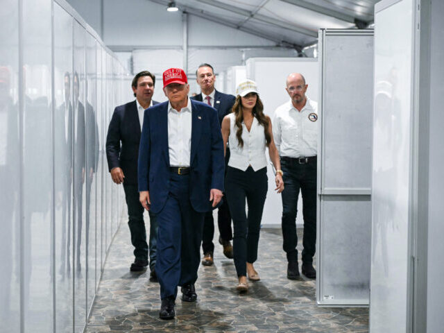 US-POLITICS-IMMIGRATION-TRUMP US President President Donald Trump (2L), Florida Governor Ron DeSantis (L), and Secretary