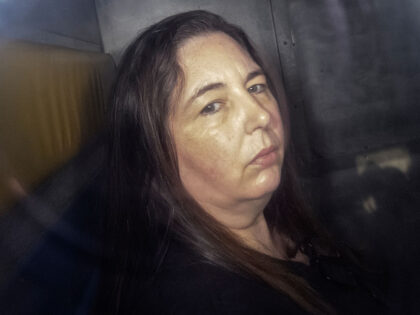TOPSHOT - This picture taken on May 12, 2025 shows Erin Patterson arriving in the back of