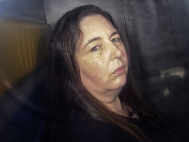 TOPSHOT - This picture taken on May 12, 2025 shows Erin Patterson arriving in the back of