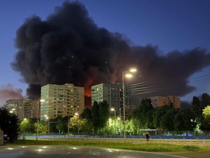 KYIV, UKRAINE - JULY 4: Smoke from the fire rises above residential apartment buildings af