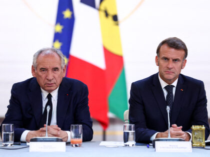French Prime Minister Francois Bayrou (L) and French President Emmanuel Macron attend a me