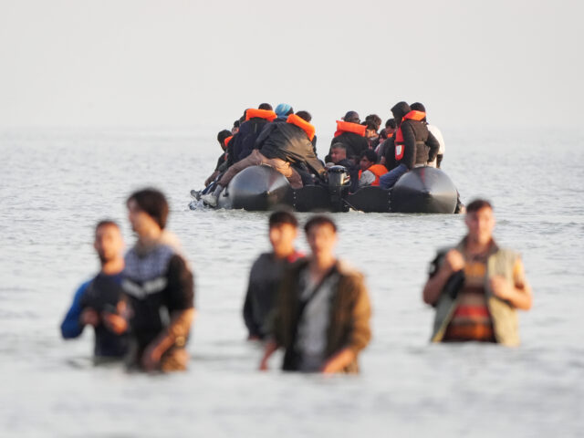 A small boat carrying people thought to be migrants leaves Gravelines, France. Picture dat