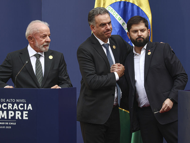 SANTIAGO, CHILE - JULY 21: President Gabriel Boric (R) greets Yasmandu Orsi of Uruguay (C)