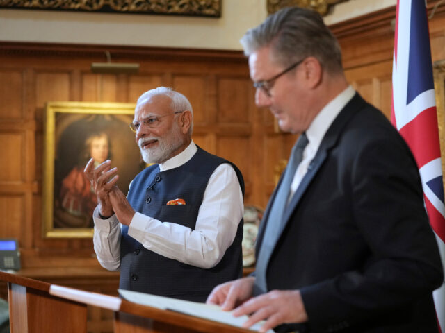 AYLESBURY, ENGLAND - JULY 24: Britain's Prime Minister Keir Starmer and Prime Minister Nar
