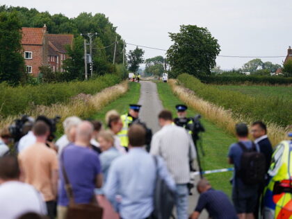 Police officers at the scene in Stathern, Leicestershire, after a 76-year-old man was arre
