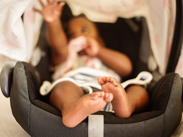 baby in car seat carrier