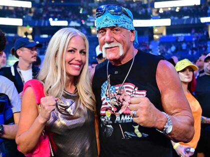 Terry "Hulk Hogan" Bollea poses with wife Sky Daily during the Jake Paul vs Mike Perry mai