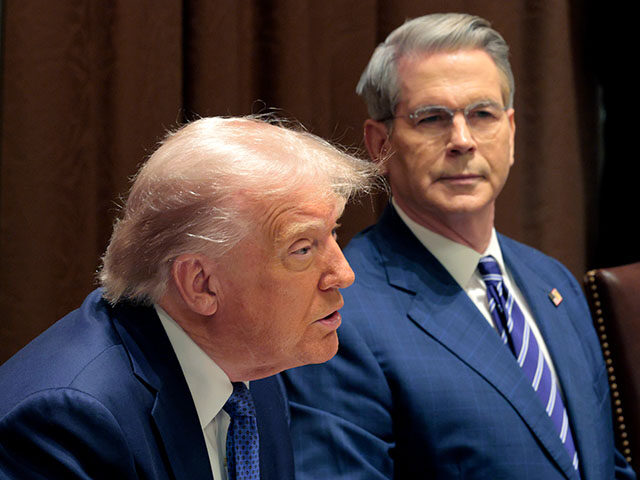 GettyImages2211794138 U.S. Treasury Secretary Scott Bessent listens as U.S. President Donald Trump delivers rema