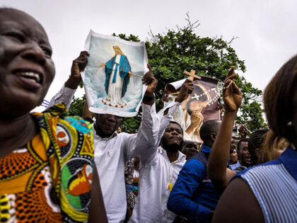 Catholics take part in a demonstration to call for the President of the Democratic Republi