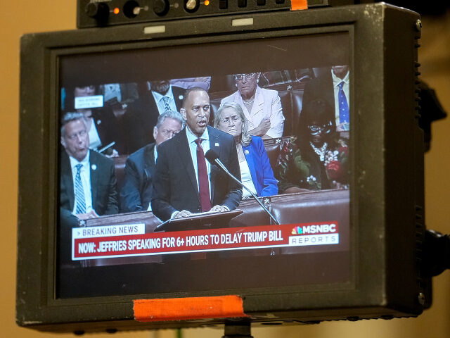 A television monitor broadcasts Representative Hakeem Jeffries, a Democrat from New York,
