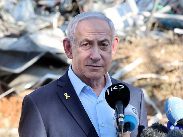 Israel's Prime Minister Benjamin Netanyahu gives a statement during a visit to the site of