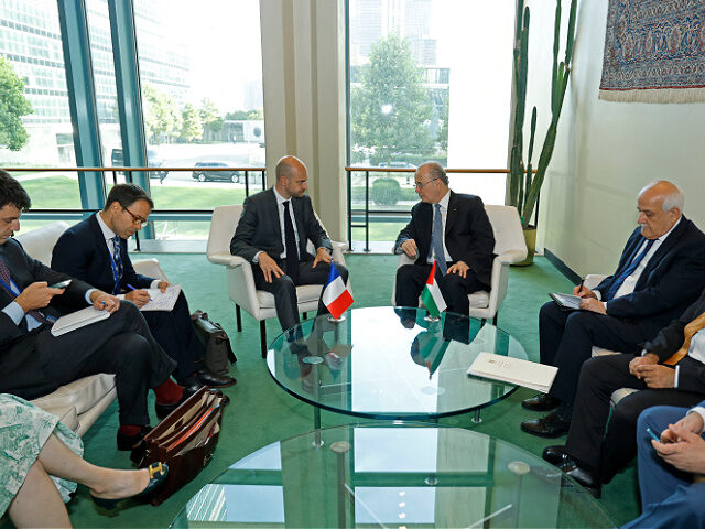 French Minister of Foreign Affairs Jean-Noel Barrot (L) meets with Mohammad Mustafa Prime