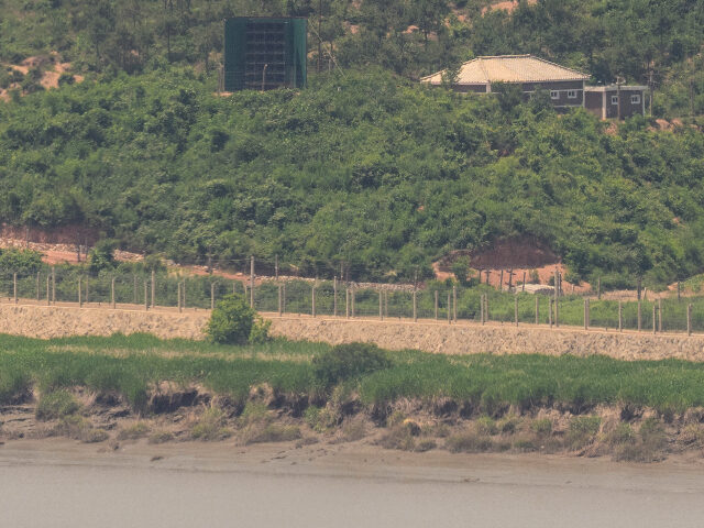 This photo shows a general view of a North Korean giant loudspeaker (C), near the Demilita