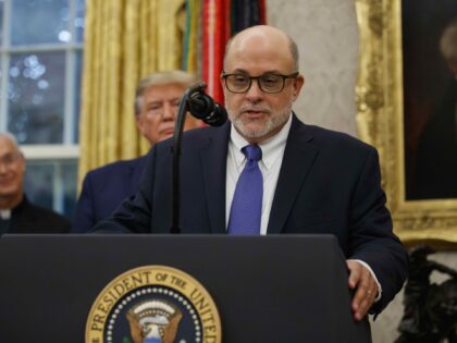 Mark Levin speaks, with President Donald Trump behind him, during a ceremony to present th