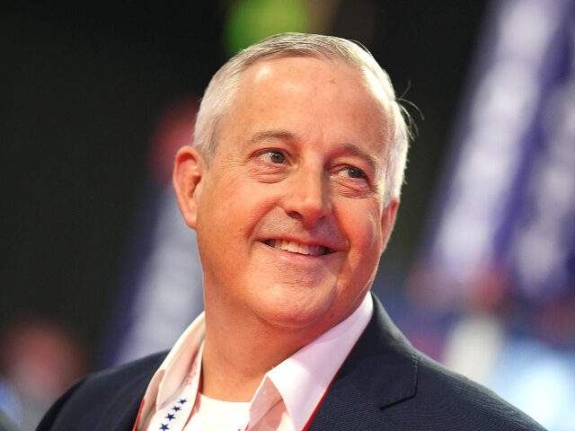 RNC Co Chair Michael Whatley walks the floor at the Fiserv Forum as preparations are under