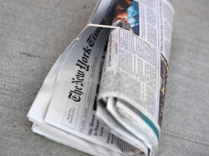 A home-delivered copy of The New York Times in a driveway in Santa Fe, New Mexico. (Robert