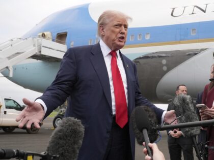 President Donald Trump speaks to members of the media after he arrived at Prestwick Airpor