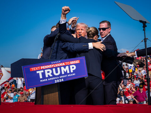 Trump Assassination Atempt Secret Service Members of the United States Secret Service surround Republican presidential nominee forme