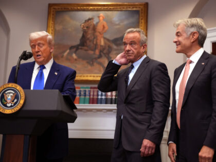 U.S. President Donald Trump (L), joined by Human Services Secretary Robert F. Kennedy Jr.