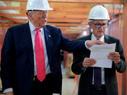 U.S. President Donald Trump and Federal Reserve Chair Jerome Powell tour the Federal Reser