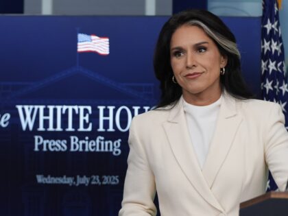 Director of National Intelligence Tulsi Gabbard listens to a question as she speaks with r