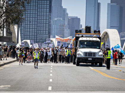 Los Angeles, CA - July 01: Several dozen protesters stage a demonstration on the Sixth Str