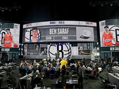 NEW YORK, NEW YORK - JUNE 25: Ben Saraf is drafted twenty-sixth overall by the Brooklyn Ne