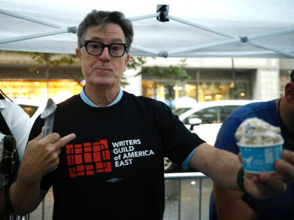 NEW YORK, NEW YORK - JULY 25: Stephen Colbert serves ice cream as Animation writers, who a