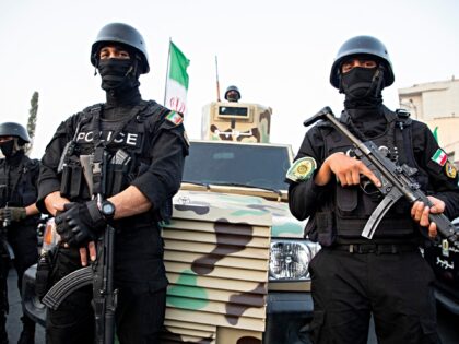 Armed NOPO special police units are on the scene as Iranians take to the streets in the do