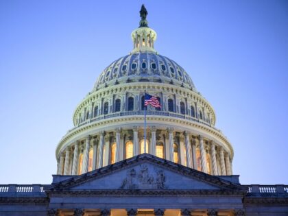 TOPSHOT - The dome of the US Capitol is seen at dusk in Washington, DC on November 13, 202