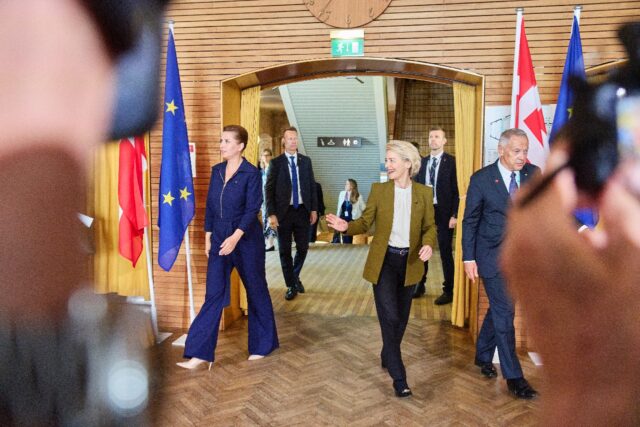 Danish Prime Minister Mette Frederiksen (R) pushes for Ukraine membership in the EU, while