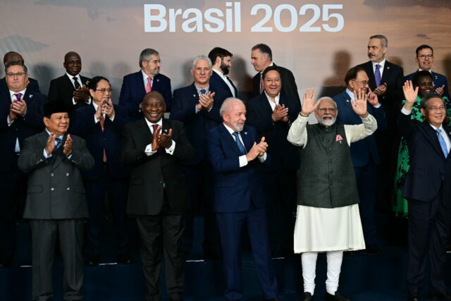 Heads of state and government applaud during the family photo at the BRICS summit in Rio d