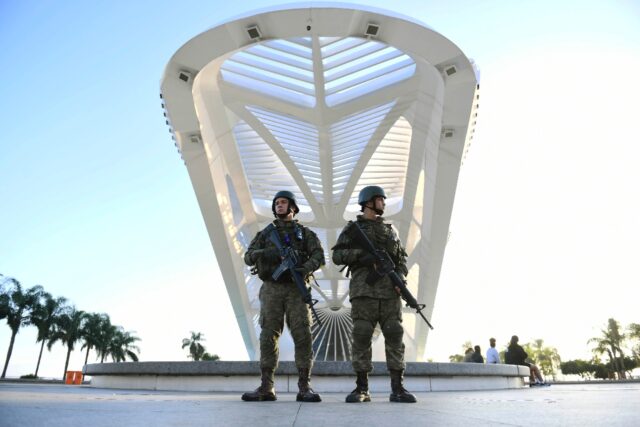 Members of the Brazilian Navy patrol the Tomorrow Museum (Museu do Amanha) at Praca Maua,