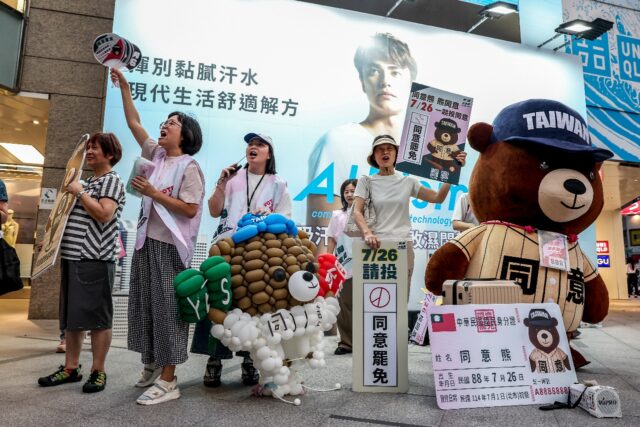 Supporters of a Taiwan recall vote shout 'Great recall, great success' in Taipei