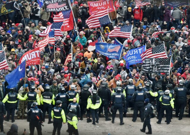 Trump supporters clash with police as they storm the US Capitol in Washington on January 6