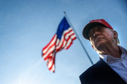 US President Donald Trump talks to members of the press as he departs from the South Lawn